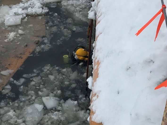 Diver going into culvert